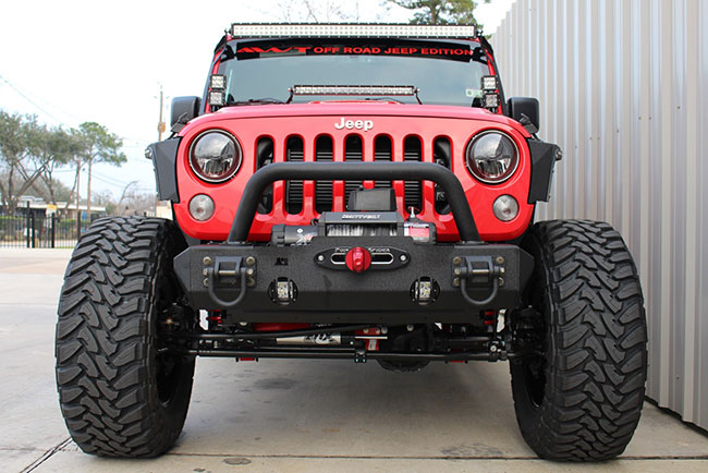 This firecracker red Jeep Wrangler Unlimited Sport could be yours today